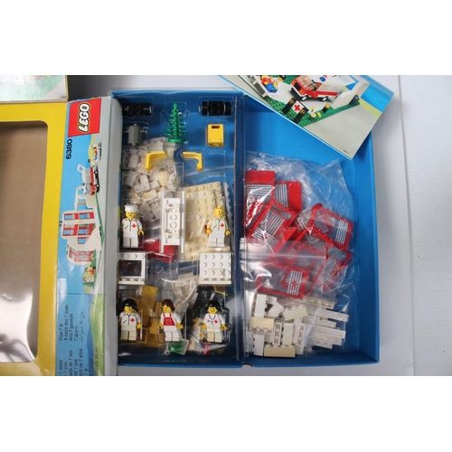 183 - A large collection of Lego to include set 6380 Ambulance Station, 6372 Cottage, 6501 Black Car, 6522... 