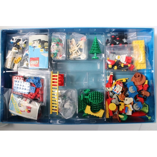 183 - A large collection of Lego to include set 6380 Ambulance Station, 6372 Cottage, 6501 Black Car, 6522... 