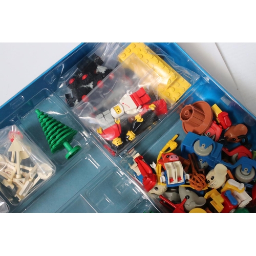 183 - A large collection of Lego to include set 6380 Ambulance Station, 6372 Cottage, 6501 Black Car, 6522... 