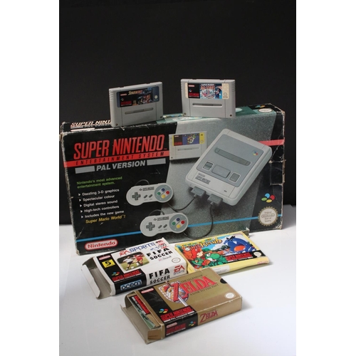 194 - Retro Gaming - Boxed Super Nintendo SNES console with one controller and Super Mario World cartridge... 