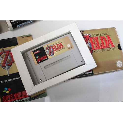 194 - Retro Gaming - Boxed Super Nintendo SNES console with one controller and Super Mario World cartridge... 