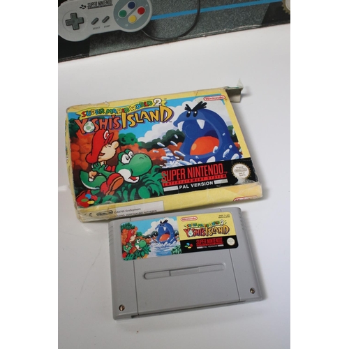 194 - Retro Gaming - Boxed Super Nintendo SNES console with one controller and Super Mario World cartridge... 