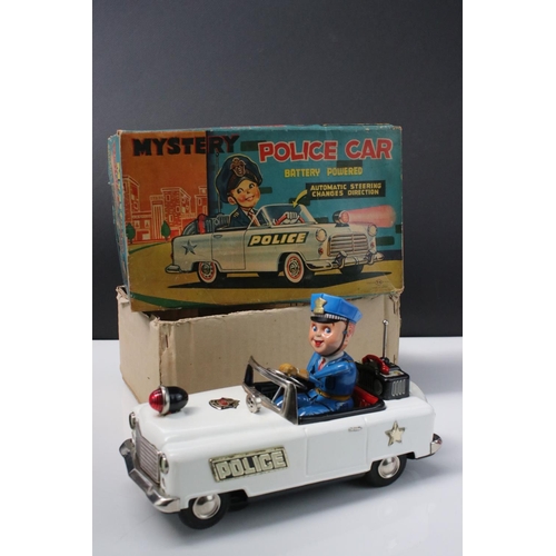 220 - Boxed Nomura TN Trade Mark (Japan) tin plate Battery Powered Mystery Police Car in vg condition, bat... 