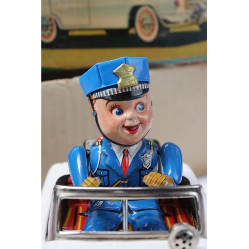 220 - Boxed Nomura TN Trade Mark (Japan) tin plate Battery Powered Mystery Police Car in vg condition, bat... 