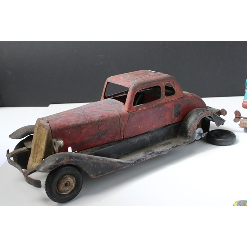 228 - Collection of ten tin plate toys, to include clockwork car,  robots, mouse photographer, elephant on... 