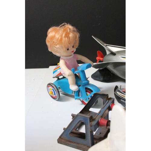229 - Group of mixed toys to include wooden puppets, plastic robot, plastic submarine etc