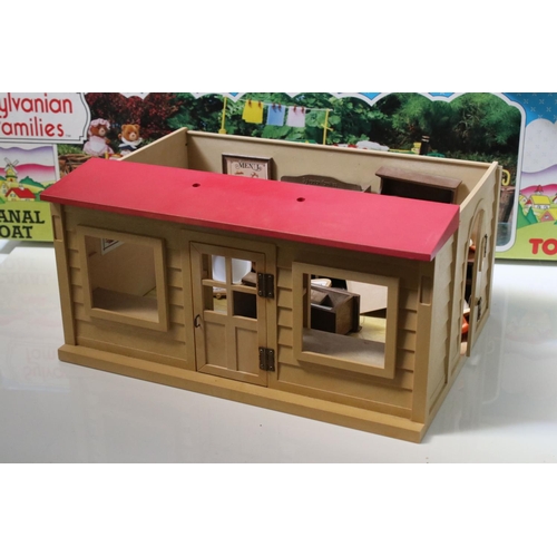 230 - Tomy Sylvanian Families to include boxed Bakery, 
boxed Canal Boat, Chalet, quantity of figures incl... 