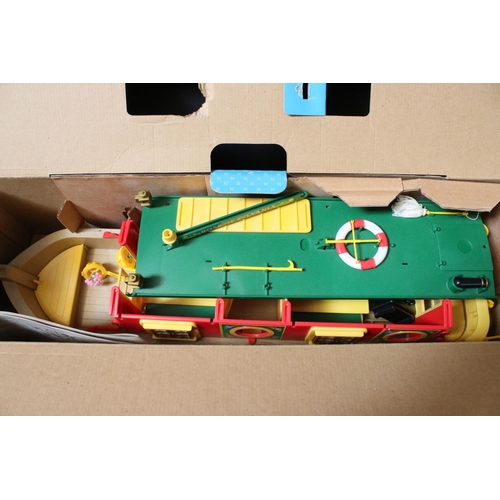 230 - Tomy Sylvanian Families to include boxed Bakery, 
boxed Canal Boat, Chalet, quantity of figures incl... 