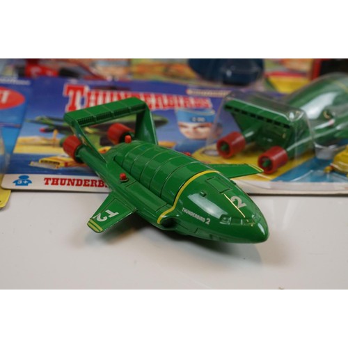 201 - Collection of carded & boxed Gerry Anderson vehicles and figures to include 5 x Matchbox Thunderbird... 