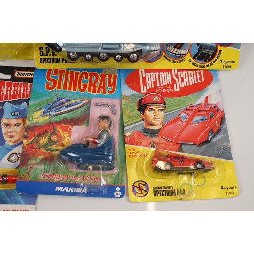 201 - Collection of carded & boxed Gerry Anderson vehicles and figures to include 5 x Matchbox Thunderbird... 