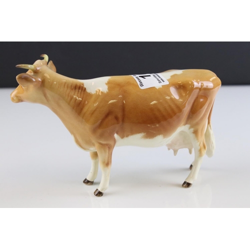 104 - Beswick Guernsey Cow, first version, model 1248a together with a Beswick Guernsey Calf, model 1249a