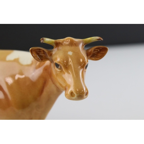 104 - Beswick Guernsey Cow, first version, model 1248a together with a Beswick Guernsey Calf, model 1249a