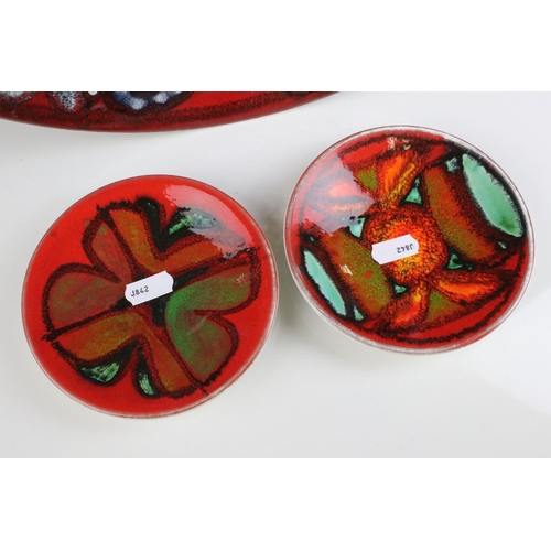 113 - Poole Pottery Charger, 36cms diameter together with Two Poole Delphis Pattern Trinket Dishes