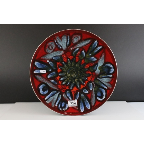 113 - Poole Pottery Charger, 36cms diameter together with Two Poole Delphis Pattern Trinket Dishes