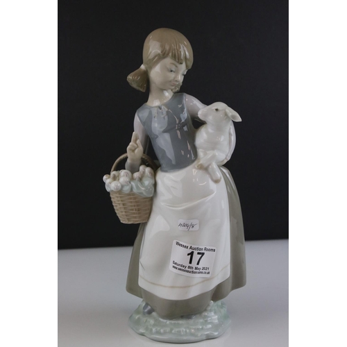 17 - Lladro figure 4835, girl with a lamb in her arms and carrying a basket