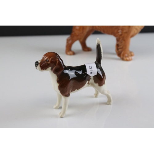 24 - Four Beswick Dogs including Corgi, Beagle, Cocker Spaniel and Terrier, walking