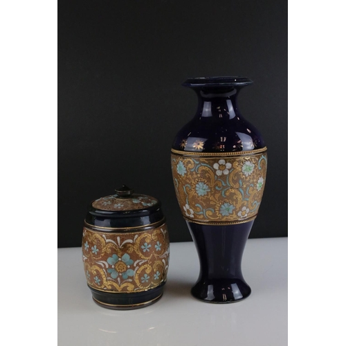 27 - Early 20th century Royal Doulton Stoneware Vase, 26cms high and Lidded Tobacco Jar, 15cms high, both... 