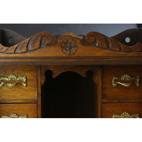 41 - Early 20th century Oak Table Top Smoker's Cabinet, the two glazed doors opening to a fitted interior... 