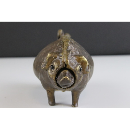 50 - Bronze hotel bell in the form of a pig (press down tail)