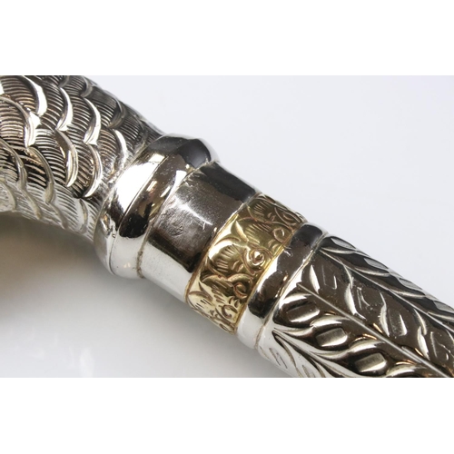 72 - Ceremonial style staff with white metal tiger's head handle