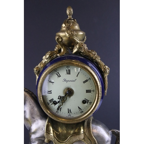 87 - Imperial Italy, German movement mantel clock with ceramic painted panel, giltwork, hour chiming