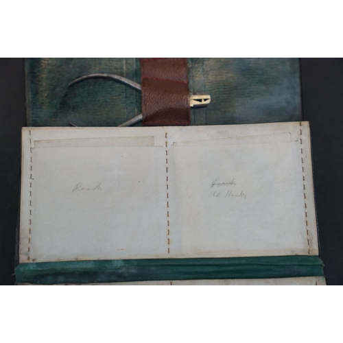 182 - A Farlow leather fishing tackle case complete with tackle, dated 1910.