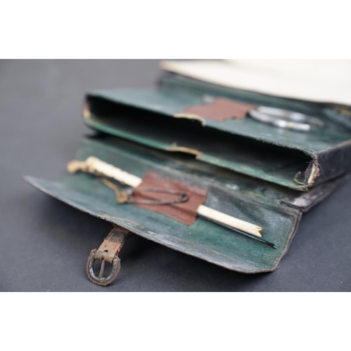 182 - A Farlow leather fishing tackle case complete with tackle, dated 1910.