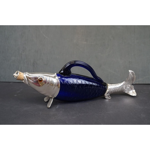 194 - Unusual claret jug in the form of a fish, with silver plated mounts