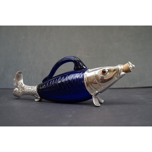 194 - Unusual claret jug in the form of a fish, with silver plated mounts