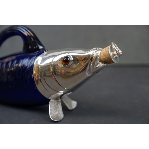 194 - Unusual claret jug in the form of a fish, with silver plated mounts