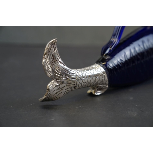 194 - Unusual claret jug in the form of a fish, with silver plated mounts