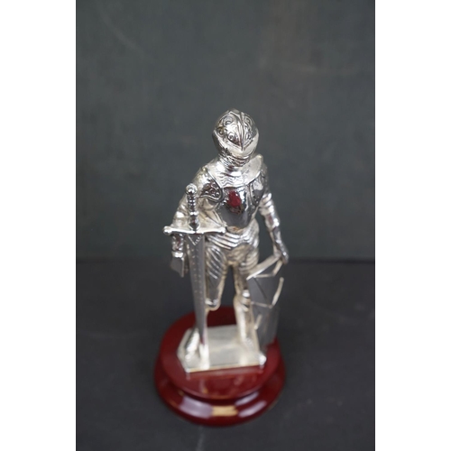 195 - A Argento 925 Silver marked figure of a Maltese Knight mounted to plinth.