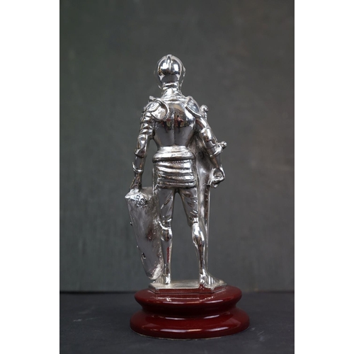 195 - A Argento 925 Silver marked figure of a Maltese Knight mounted to plinth.