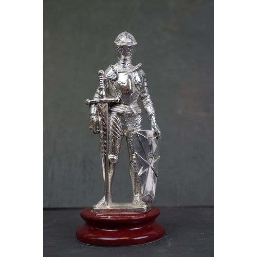 195 - A Argento 925 Silver marked figure of a Maltese Knight mounted to plinth.