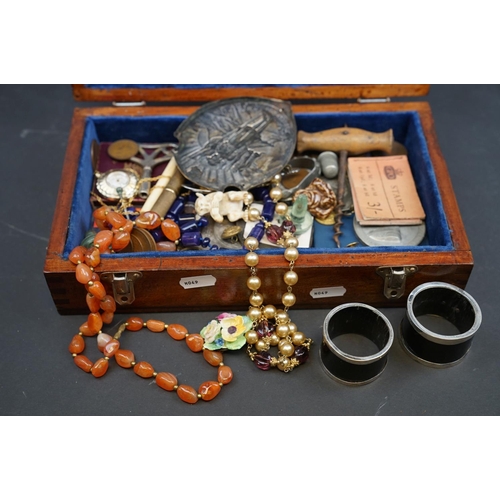 205 - A group of mixed collectables to include jewellery, watches, coins and medallions contained within a... 