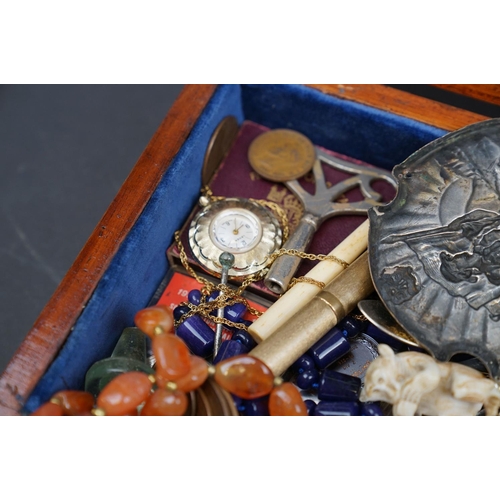 205 - A group of mixed collectables to include jewellery, watches, coins and medallions contained within a... 