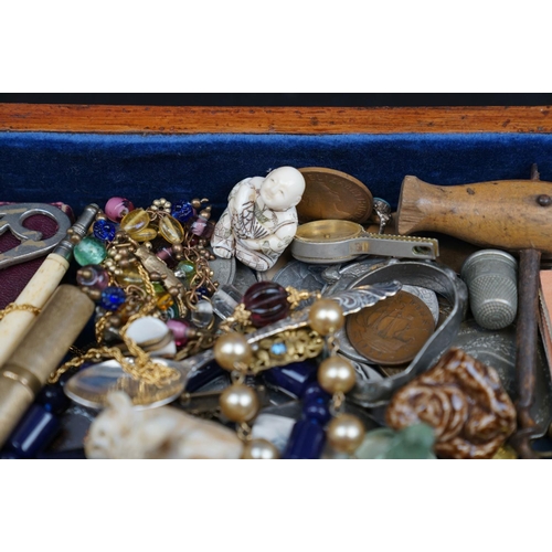 205 - A group of mixed collectables to include jewellery, watches, coins and medallions contained within a... 