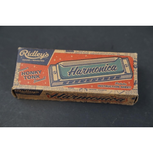 214 - A collection of seven vintage Harmonica's to include M.Hohner examples.