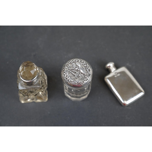 222 - A box of mixed collectables to include an hallmarked silver topped scent bottle, a selection of hall... 