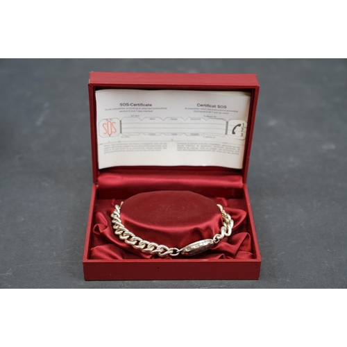 224 - A vintage boxed SOS Talisman bracelet together with a quantity of costume jewellery including silver... 