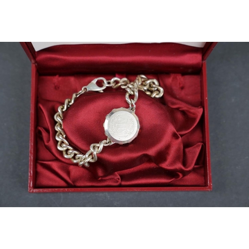 224 - A vintage boxed SOS Talisman bracelet together with a quantity of costume jewellery including silver... 