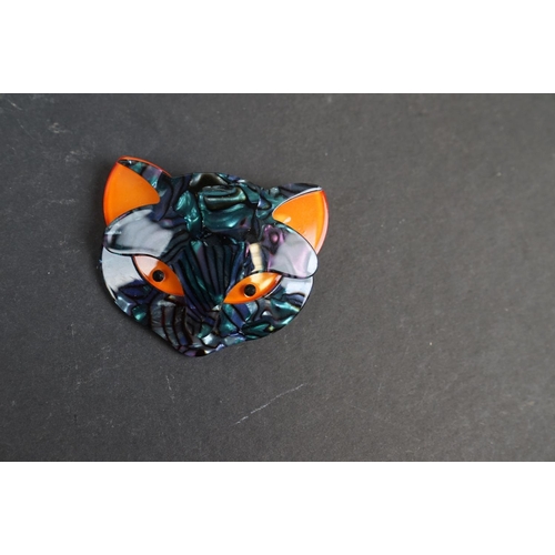 229 - Two Lea Stein style cat brooches.