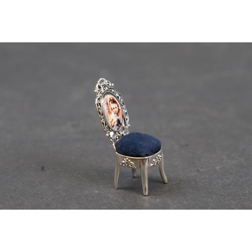 240 - Silver and enamel pincushion in the form of a chair, stamped Sterling