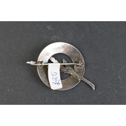 244 - A collection of sterling silver mid century jewellery to include a scottish silver brooch and two Sc... 