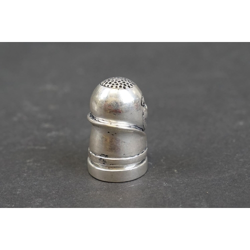 245 - Silver plated Humpty Dumpty thimble and pincushion set