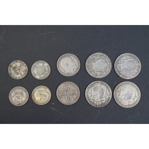 255 - Small quantity of silver & half silver coins to include crowns, florins etc