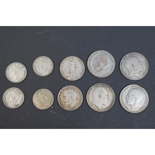 255 - Small quantity of silver & half silver coins to include crowns, florins etc