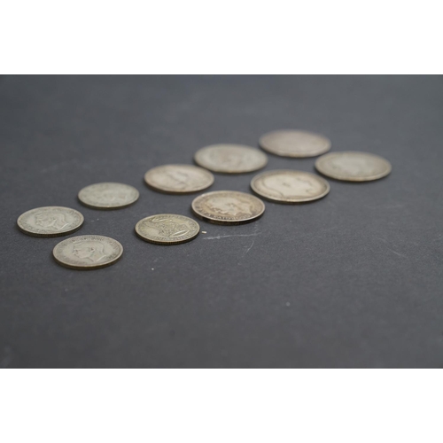 255 - Small quantity of silver & half silver coins to include crowns, florins etc