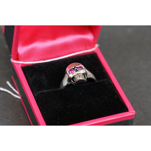 268 - Silver skull ring, stamped 925