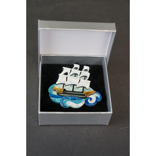 275 - Boxed Lea Stein style brooch of a three mast sailing boat on the sea